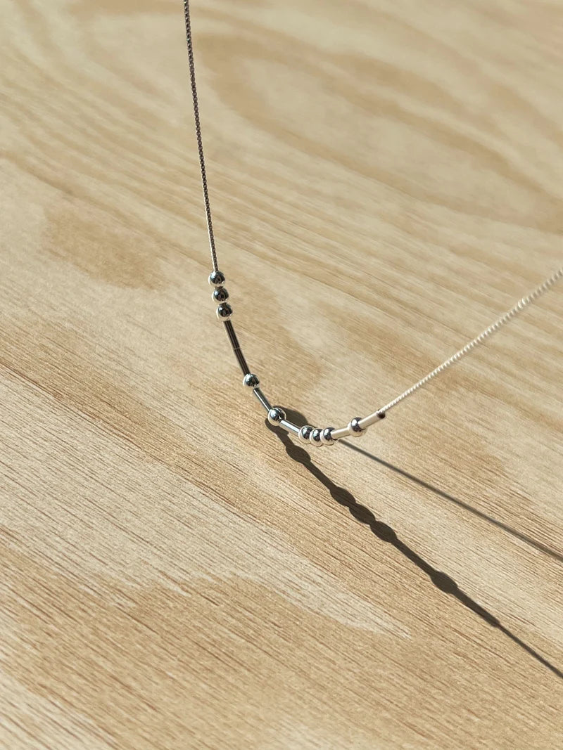 Collar con Código Morse